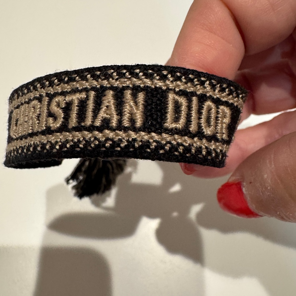 NEW CHRISTIAN DIOR PARIS EMBROIDERED FREINDSHIP BRACELET/ ADJUSTABLE WITH TASSEL